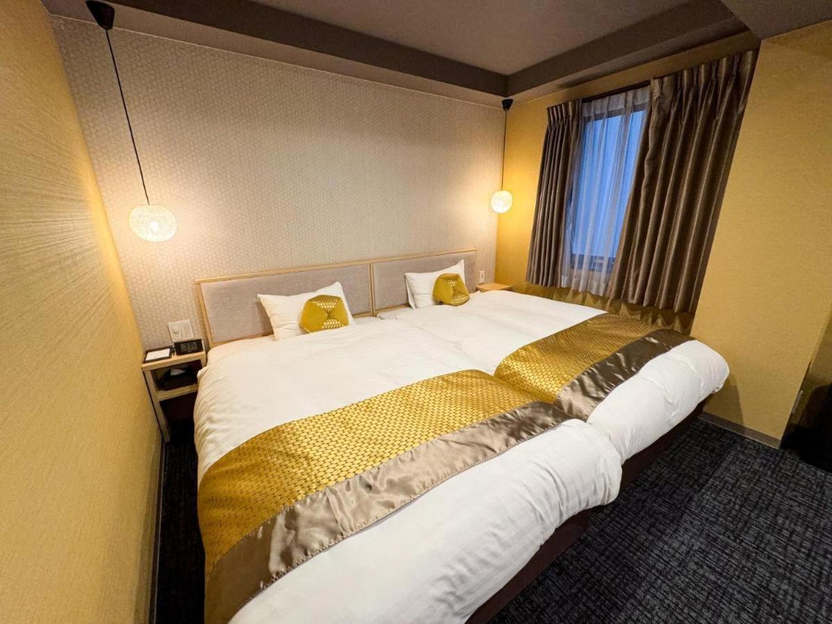Madoka Station West Hotel 3*